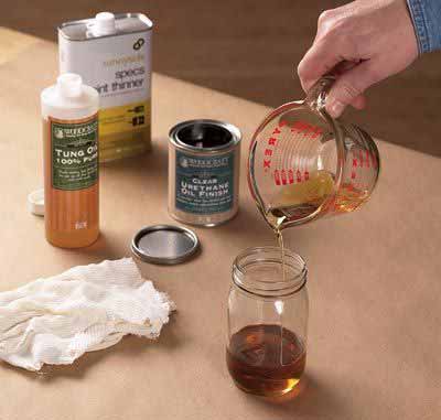 Mix the tung oil with solvent