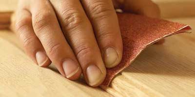 sanding the cedar wood